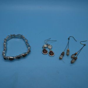 Brown tone bracelet and earrings.